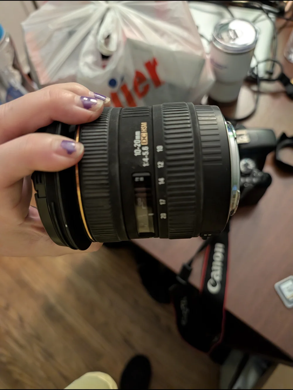 Canon DSLR Camera with Black Lenses and Charger